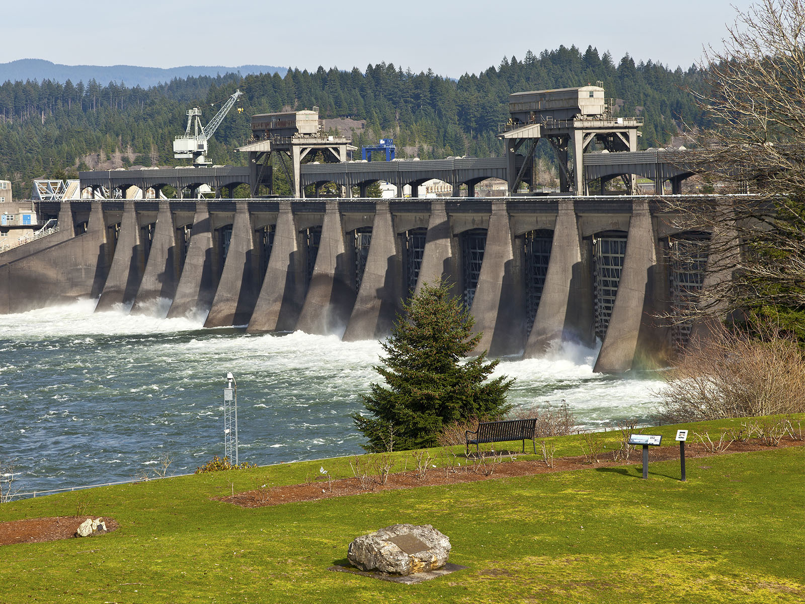 Water is released through the gates of Bonneville Dam on the Columbia River near Portland, Ore.