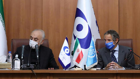 Head of the Iranian Atomic Energy Agency Ali-Akbar Salehi and Director General of the International Atomic Energy Agency (IAEA) Rafael Grossi